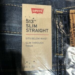 Levi jeans 513 Slim Straight - sits below the waist and slim through hips 38x30